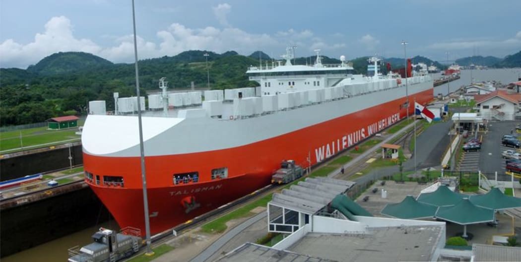 A Panamax ship in transit through the Miraflores locks, Panama Canal