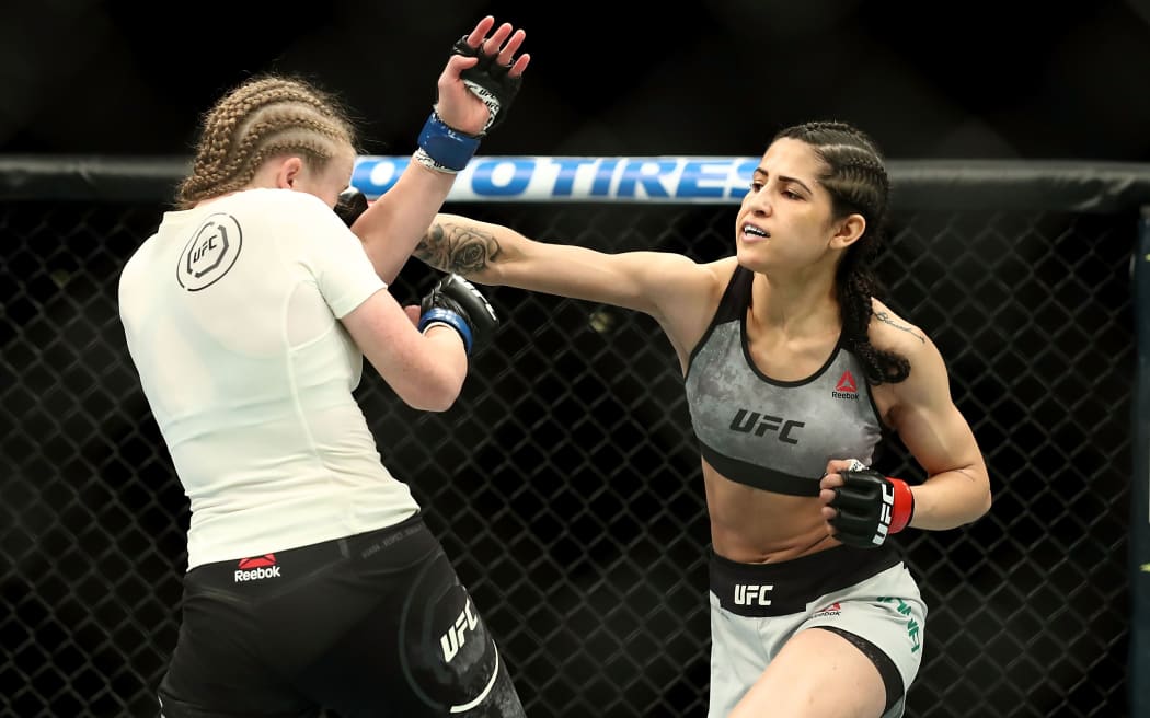 Polyana Viana punches JJ Aldrich in the UFC.