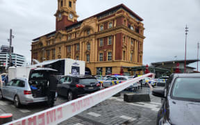 Police have evacuated Auckland's Ferry Building due to a man on the roof.