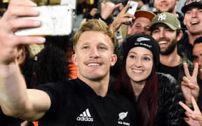 All Blacks Damian McKenzie takes a self with supporters.
All Blacks v France, Eden Park, Auckland, New Zealand. 9 June 2018.