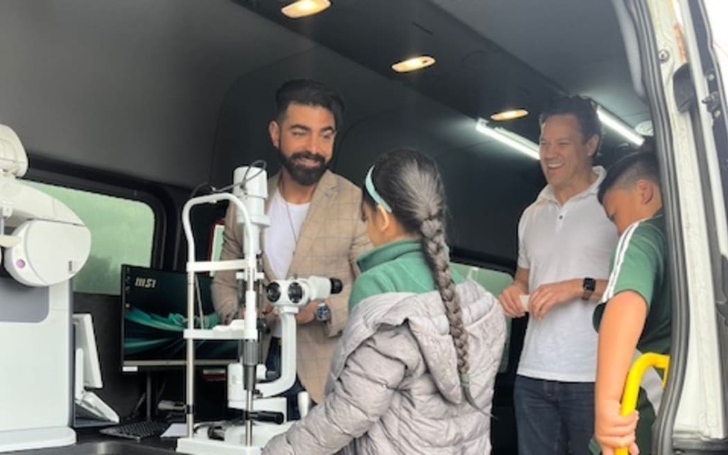 Lynden Mason Volunteer Optometrist (L)  with Tim Way from OIC the equipment supplier. Celia the optometry bus cost $500,000 for the van, equipment  and fit out. 

Next step for Painga Project  is to secure the $700,000 per year operating funding.
