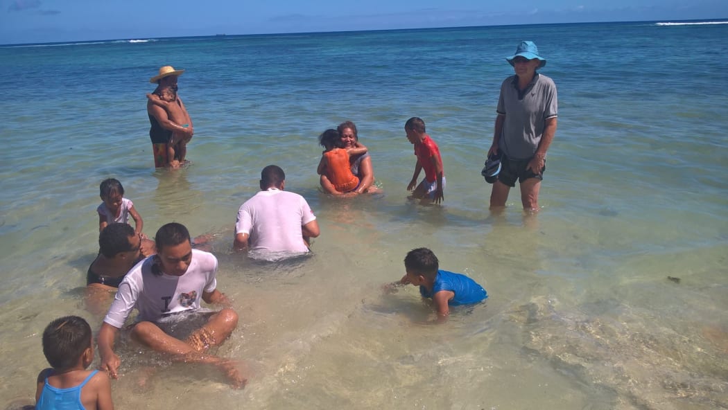 Carer John Swift takes a group out for a day at the beach. Many had never been in the sea before.