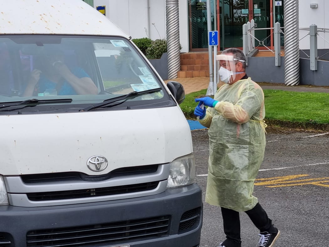 Ngaruahine Iwi Health Services general manager Warren Nicholls administers a Covid test in Stratford.