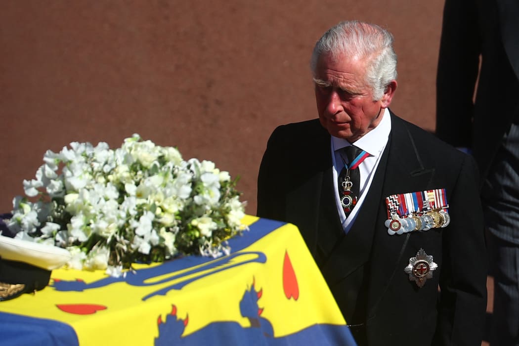 Prince Charles accompanies his father's coffin.