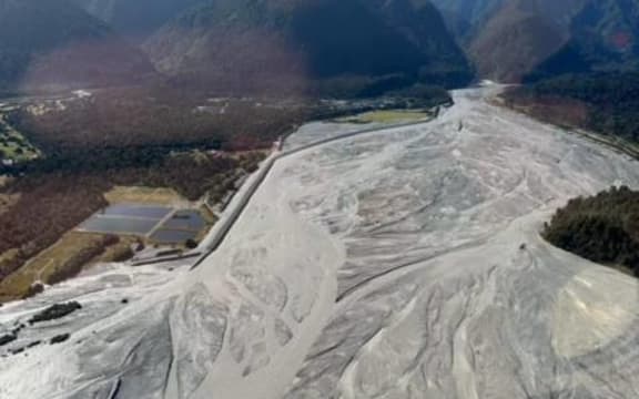 An aerial view of the Waiho (Waiau) River north bank looking inland to Franz Josef township, top left, on 24 January.
