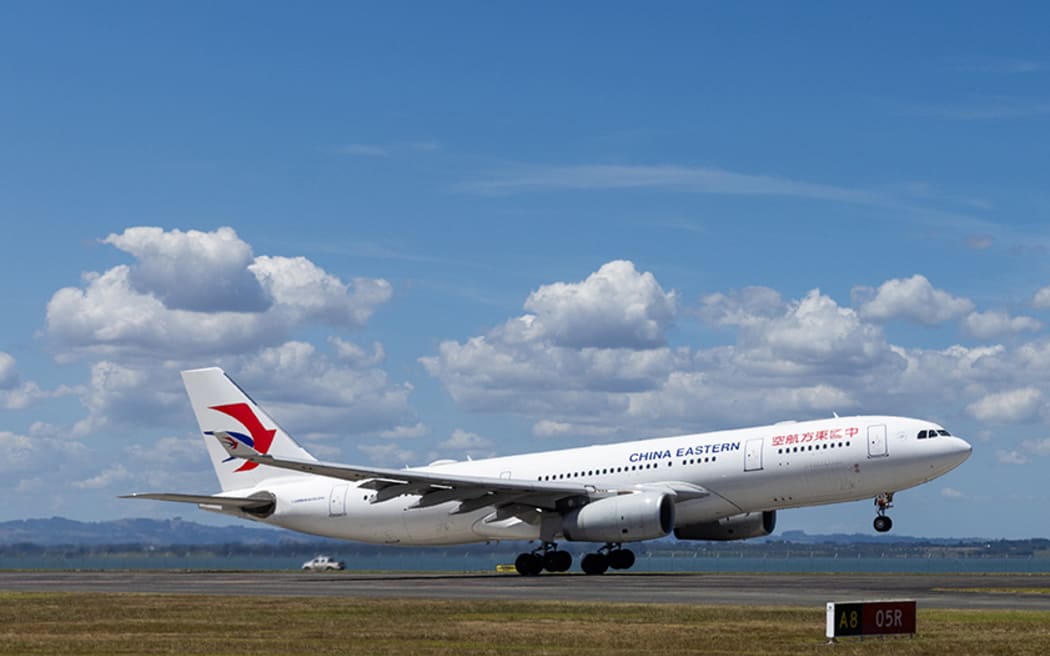 Aucklnd International Terminal, airside planes  - China Eastern plane at Auckland International Airport