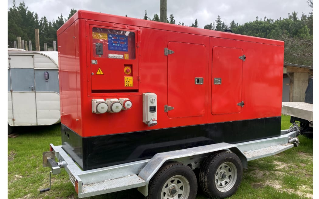 A 140kva generator sitting on a trailer.