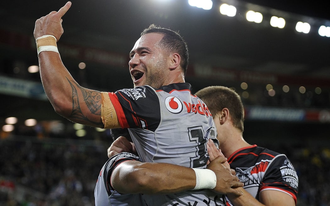 The Warriors' Bodene Thompson celebrates a try.