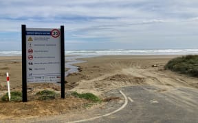 A sign at Glinks Gully, a popular vehicle access to Ripiro Beach, spells out expectations for beach users.