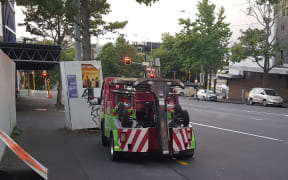 The two truck parked illegally on Cook St in central Auckland for about half an hour.