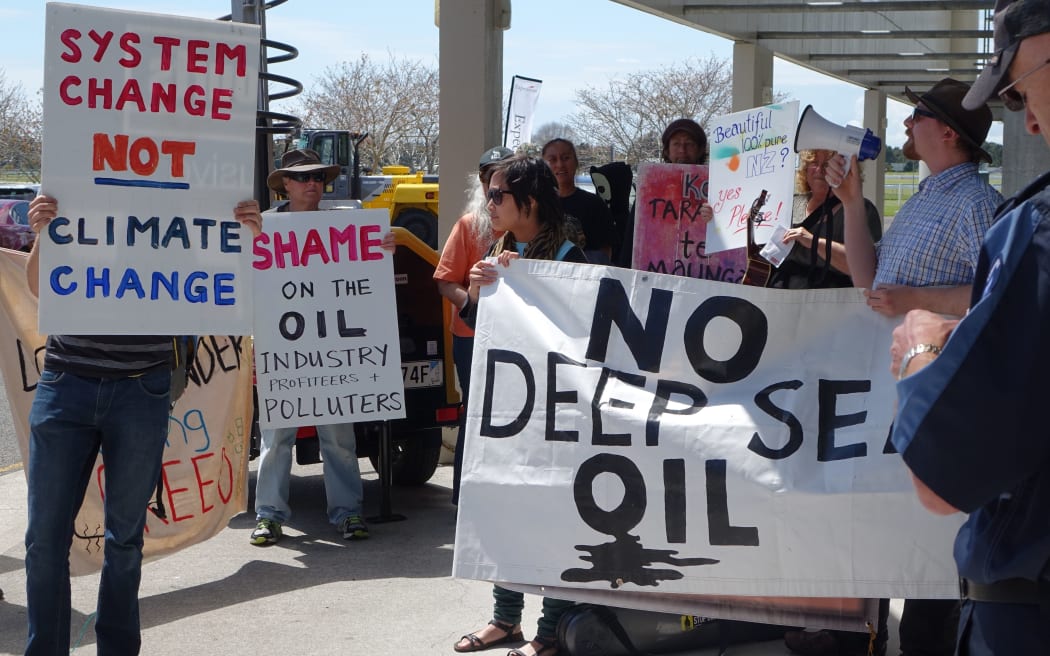 Protestors outside the oil and gas industry conference in New Plymouth.