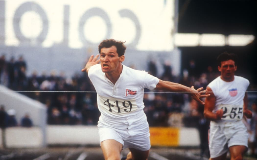 Ben Cross as Harold Abrahams breaks the tape in Chariots of Fire