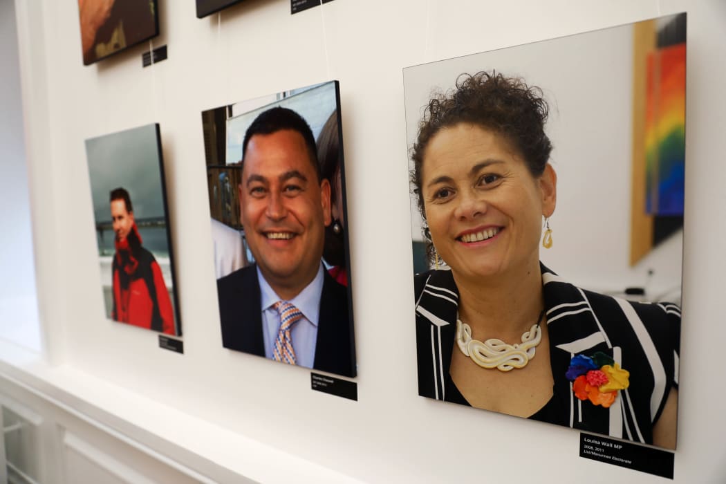 Photos of LGBTQ Parliamentarians on the wall of the rainbow room. Labour MP Louisa Wall's portrait is on the right.