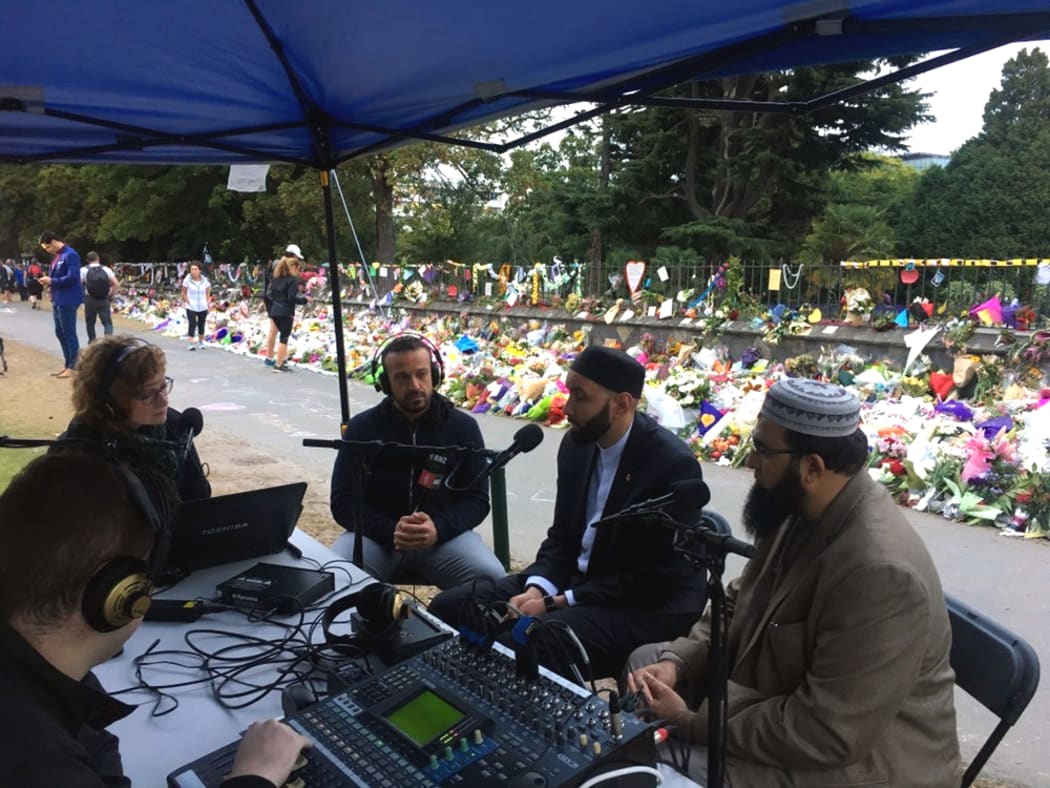 Susie Ferguson, Mohamed Hassan, Omar Suleiman and Qasim Rashid Ahmad discuss issues around the Christchurch mosque attacks, from the RNZ special broadcast outside the Botanic Gardens.