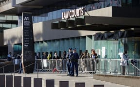People arriving at the High Court in Christchurch this morning.