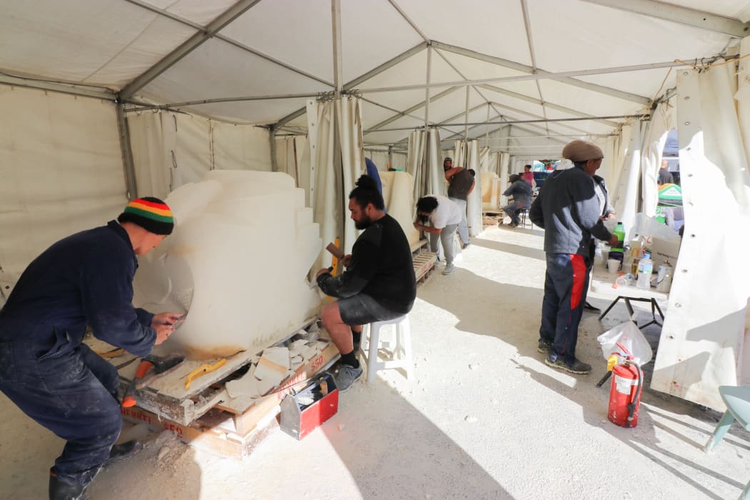Stone carvers at a carving symposium in Manukau South Auckland.