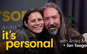 Jon Toogood joins Anika Moa in studio for season two of It's Personal. The words "It's Personal" appear in yellow and bold, with the words "with Anika Moa + Jon Toogood" in white.