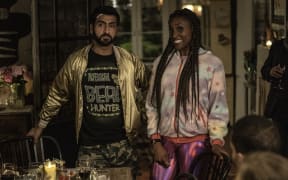 Kumail Nanjiana as Jibran, Issa Rae as Leilani of "The Lovebirds" from NETFLIX.
