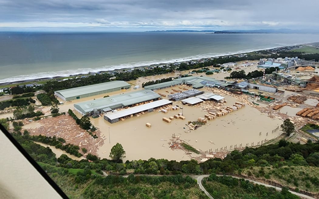 Flood mitigation work has begun to protect Pan Pac, pictured the day after Cyclone Gabrielle, and Whirinaki residents from future flooding.