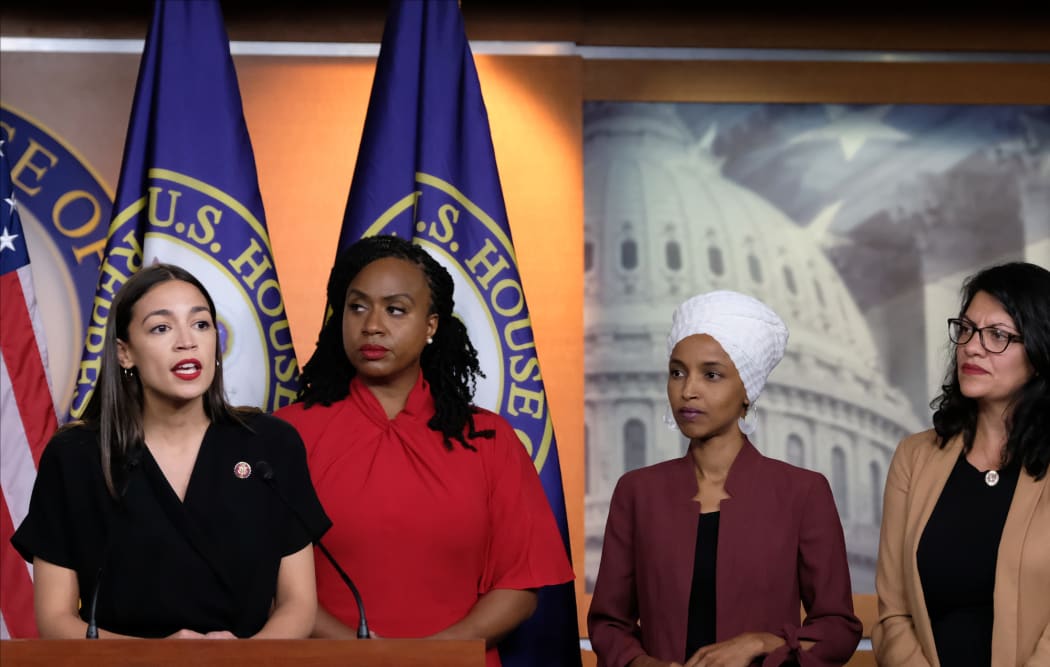 Alexandria Ocasio-Cortez (left) speaks as Ayanna Pressley, Ilhan Omar and Rashida Tlaib listen during a press conference at the US Capitol.
