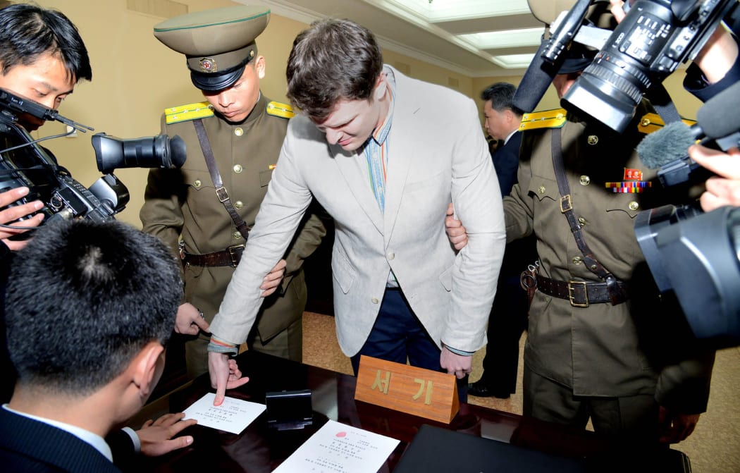 Otto Warmbier admitted stealing a propaganda sign during a trip to North Korea.