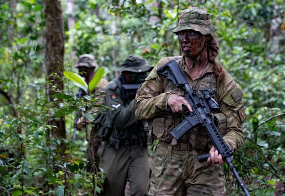 New Zealand Army and Republic of Fiji Military Forces personnel work together in the Nausori Highlands during Exercise Cartwheel 23.