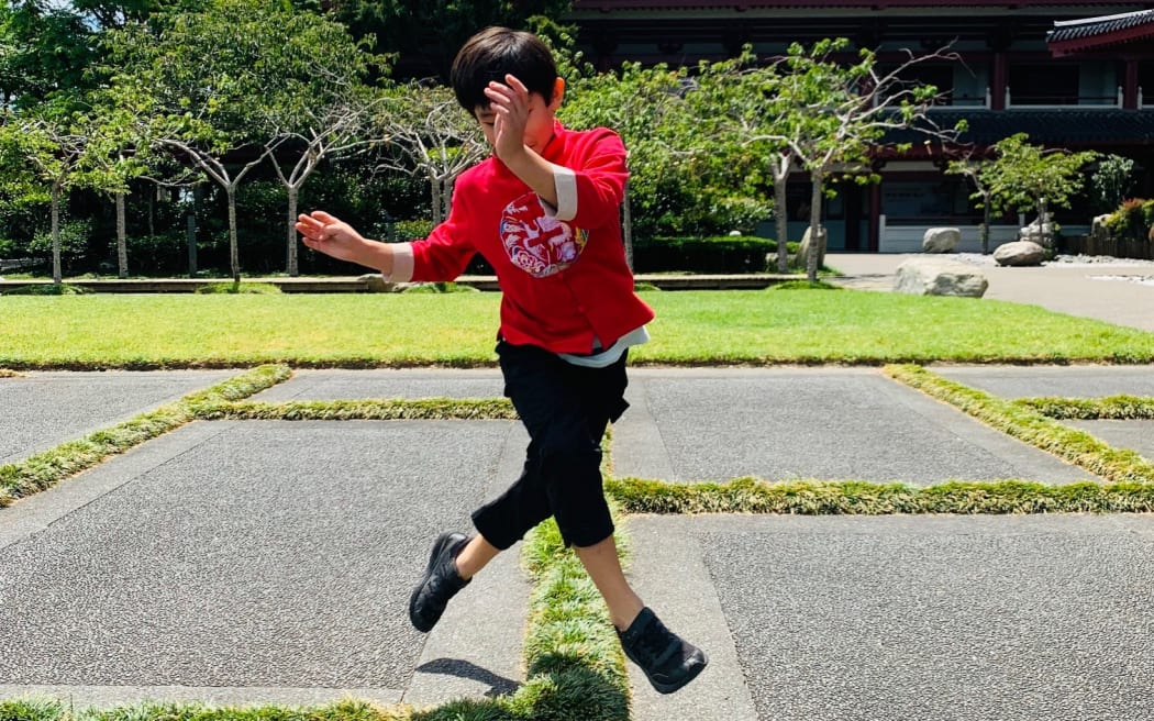 Chinese New Year: Renee Liang's son at Fo Guang Shan Buddhist Temple modelling CNY wear.