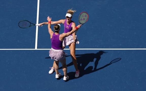 Erin Routliffe of New Zealand (R) celebrates with partner Gabriela Dabrowski of Canada after winning the 2025 US Open doubles title.