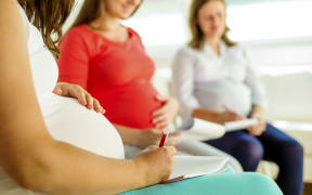 Pregnant women at clinic.