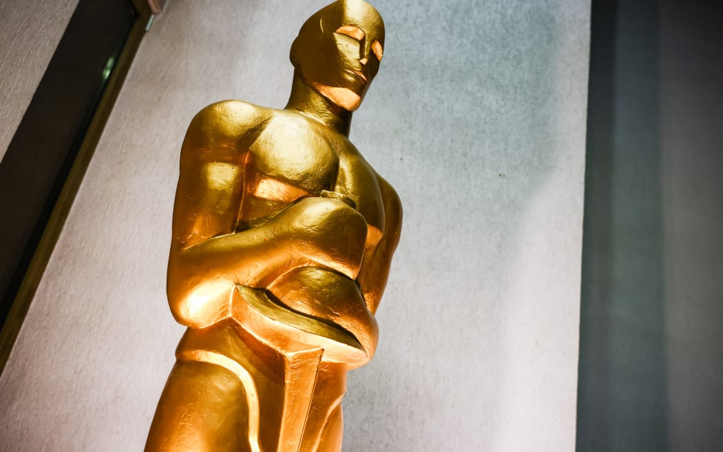 The Academy Award statuette giant replica is seen in Kino Kijow cinema two weeks before the 96th Oscars ceremony will take place in the Dolby Theatre in Hollywood, Los Angeles, California in the United states of America. Krakow, Poland on February 26, 2024.  (Photo by Beata Zawrzel/NurPhoto) (Photo by Beata Zawrzel / NurPhoto / NurPhoto via AFP)