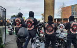 Back of head hunters gang members showing the patch
