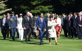 Indonesia's president Joko Widodo, centre, with Governor General Dame Patsy Reddy, arriving at Government House.