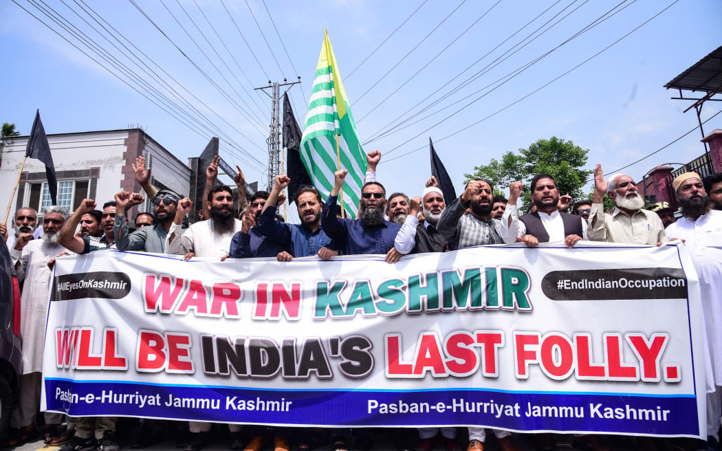 Activists and members of Pasban-e-Hurriyat, a Kashmiri refugee organisation, shout slogans during an anti-India protest in Muzaffarabad, the capital of Pakistan-administered Kashmir, on May 5, 2025. The Pakistan military said on May 5, 2025 it had conducted a second missile test since a fresh stand-off with India over the disputed region of Kashmir. New Delhi has blamed Islamabad for backing a deadly attack on tourists on the Indian side of the divided territory last month, sparking a series of heated threats and diplomatic tit-for-tat measures.