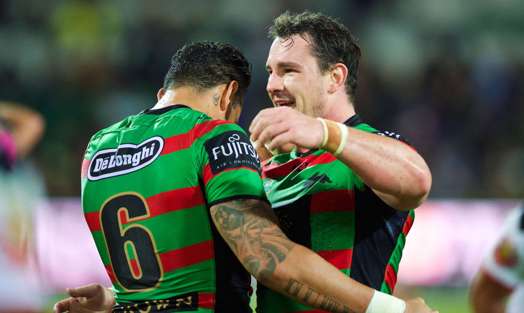 Rabbitohs players celebrate after NRL win. 2014.