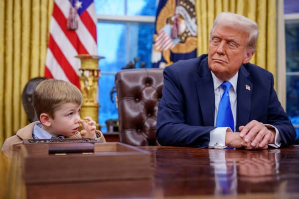 X Musk, the son of Tesla and SpaceX chief executive Elon Musk, stands next to US President Donald Trump during an executive order signing in the Oval Office at the White House on February 11, 2025 in Washington, DC.