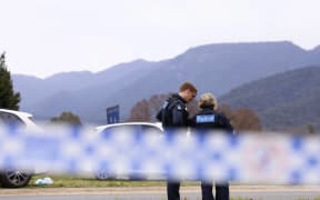 Australian police at the scene near Porepunkah where three officers were shot.