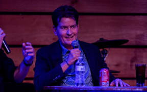 NASHVILLE, TENNESSEE - MAY 19: Charlie Sheen speaks on stage during the Backstage with Tommy Howell residency at City Winery Nashville on May 19, 2023 in Nashville, Tennessee.   Jason Davis/Getty Images/AFP (Photo by Jason Davis / GETTY IMAGES NORTH AMERICA / Getty Images via AFP)