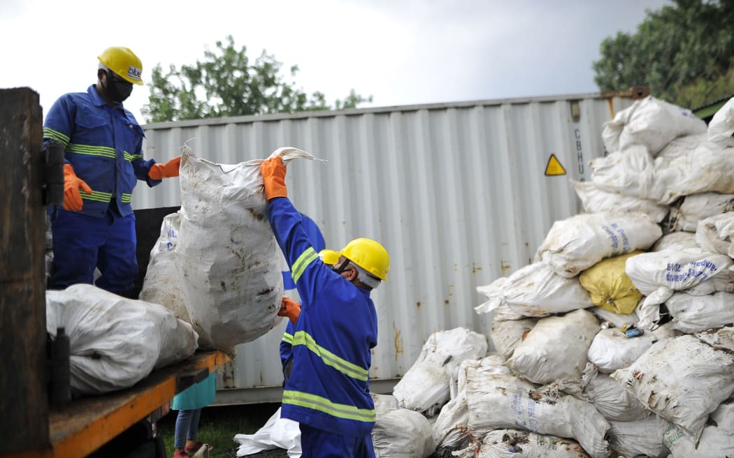 Workers from the recycle company Blue Waste 2 Value load the waste garbage's collected from Mount Everest and Base Camp in Kathmandu, Nepal on Wednesday, June 05, 2019.