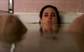 Movie still from the 2003 film House of Sand and Fog featuring Jennifer Connelly