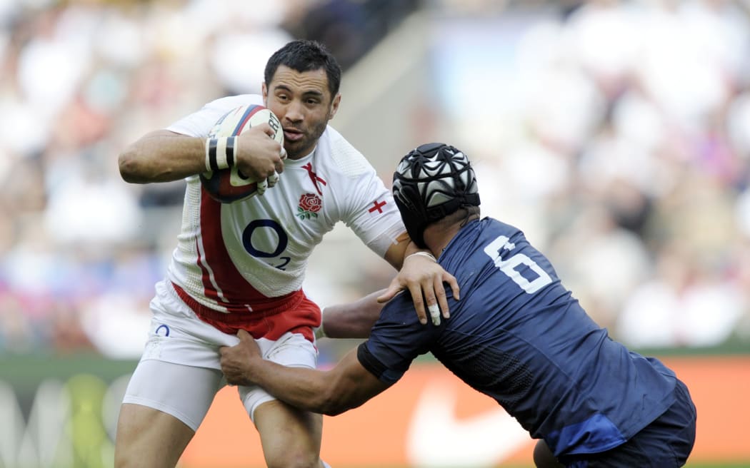 England try scorer Riki Flutey is tackled by France flanker Thierry Dusautoir 
England v France, Six Nations Championship, Twickenham Stadium, London, England, Sunday 15th March 2009
***Mandatory Credit: Fotosport/Olly Greenwood***
