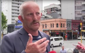Gareth Morgan outside TVNZ HQ in Auckland telling reporters why he'd "get rid off TVNZ" - and RNZ.