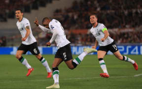 Georginio Wijnaldum of Liverpool celebrates after scoring.