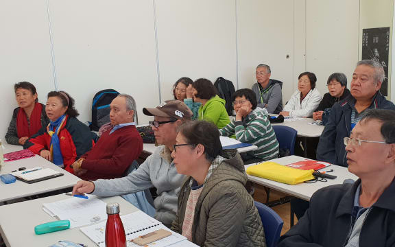 Lu Yafei and John Zhang in class