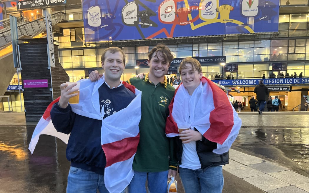 Fans turn out on a wet French evening for the Rugby World Cup semi-final between England and South Africa.