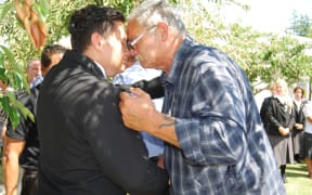 Rocky King, from Hauraki Plains College, welcomes Waati Ngamane, representing the Pare Hauraki iwi, at Hauraki Plains College in Ngatea on 10 February 2016.