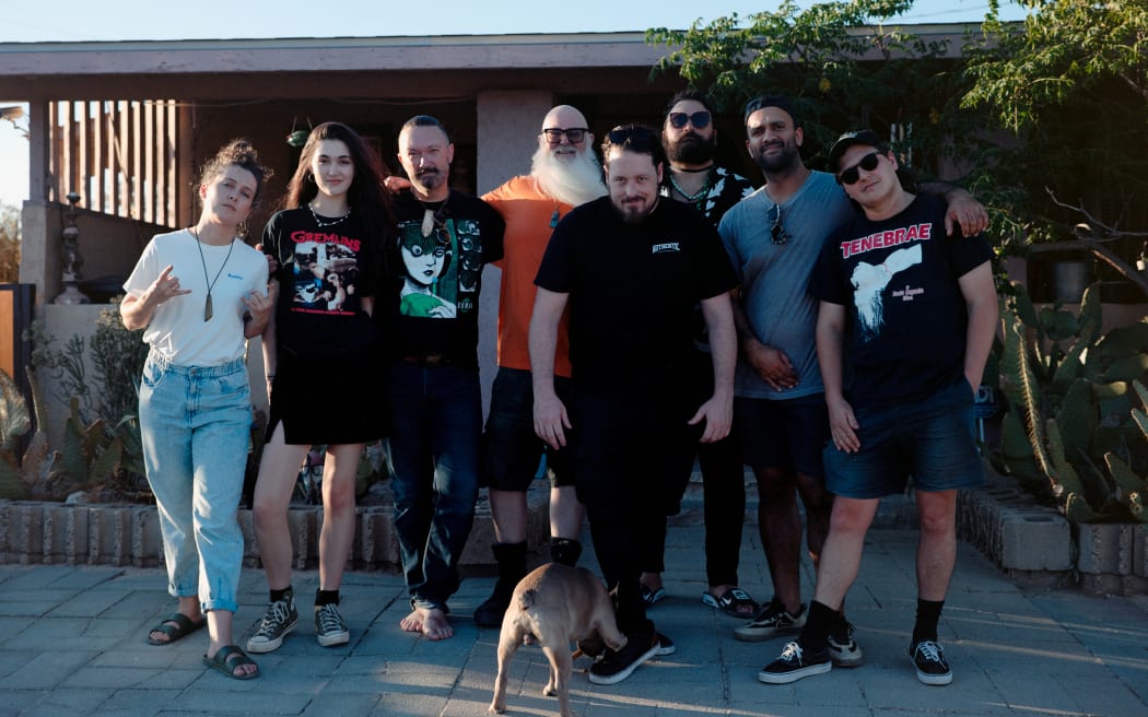 Marika Hodgson, Sophia Kirkwood, TeMatera Smith, Dave Catching, Jon Russo, Troy Kingi, Treye Liu, and Ezra Simons outside Rancho de la Luna.