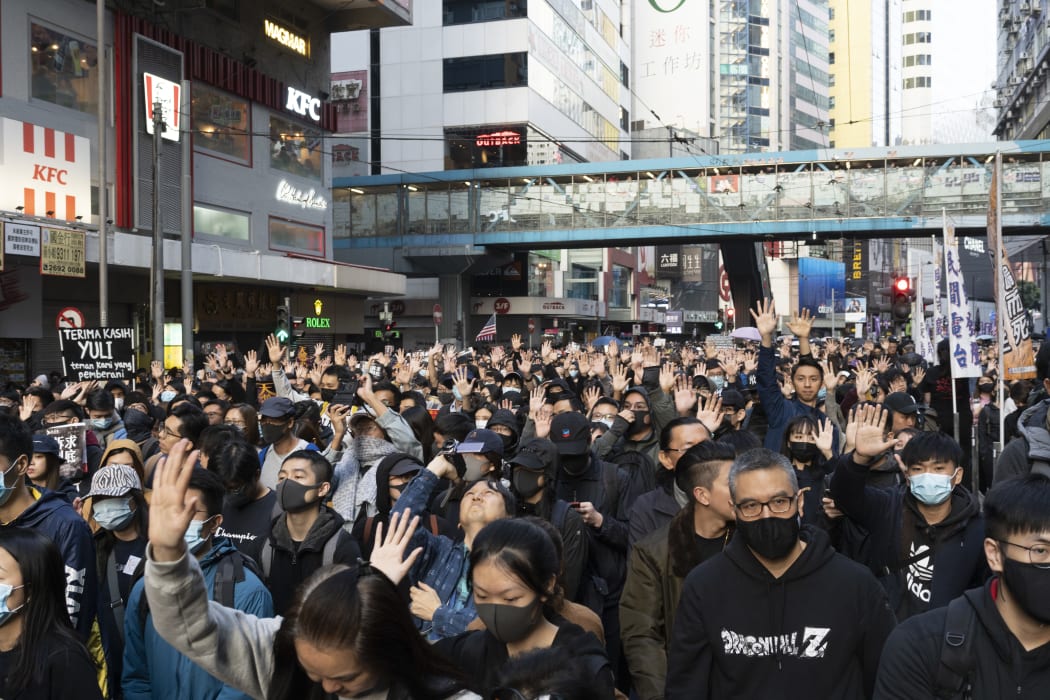 Pro-democracy protesters at an event on 8 December.