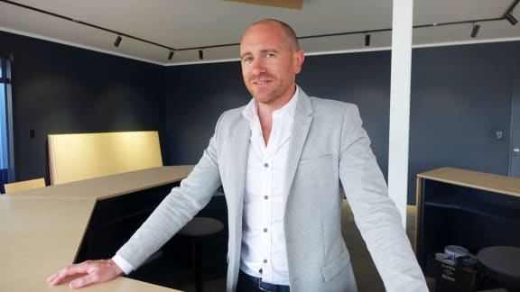 Edgesmith CEO Gareth Knight standing in the company's reception area