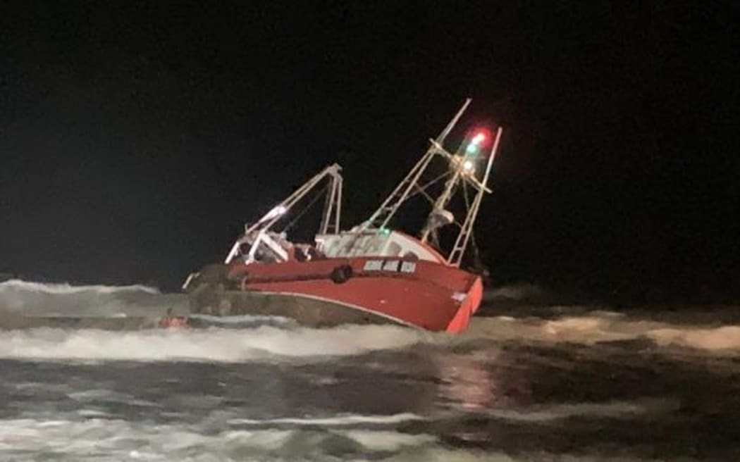 Capsized boat off the coast at Waimairi Beach in Christchurch