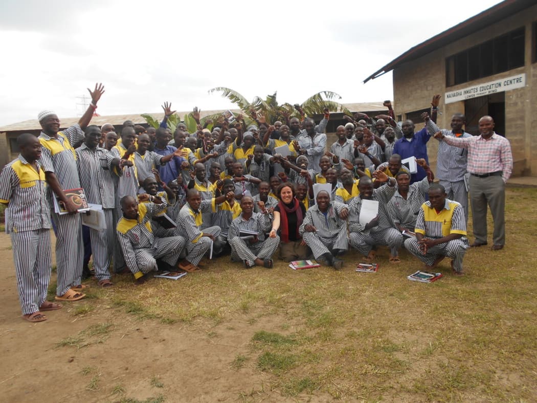 Inmates at a Kenyan prison wearing bracelets symbolising their new mindful leader identities. CREDIT:Joseph Mugatha